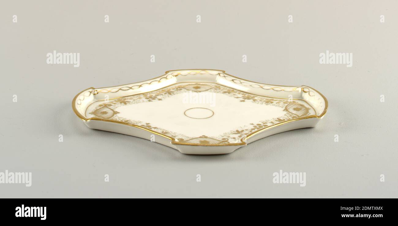 Tray, from a Miniature Tea Set, porcelain, gold, For the miniature tea set composed of the following pieces, 1920-19-52 to -57. Oval, with concave cutouts on two diagonal axes. High convex rim, with beading in gold: flat bottom bordered with conventional flowers, foliage and tendrils., Austria, 1830–1860, ceramics, Decorative Arts, tray, tray Stock Photo