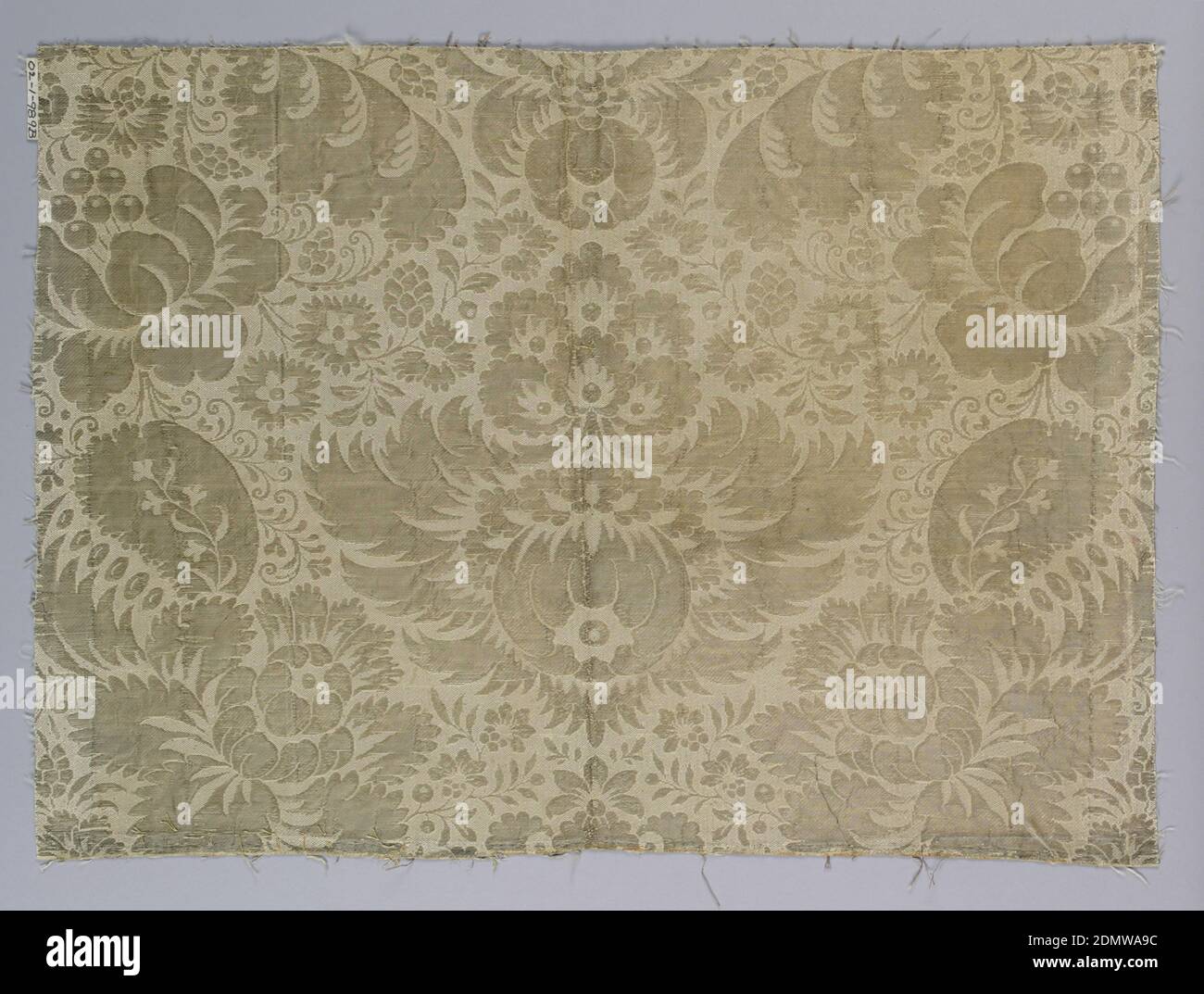 Fragments, medium: silk, metallic Technique: woven, Symmetrical floral pattern in silver and white., 18th century, woven textiles, Fragments Stock Photo