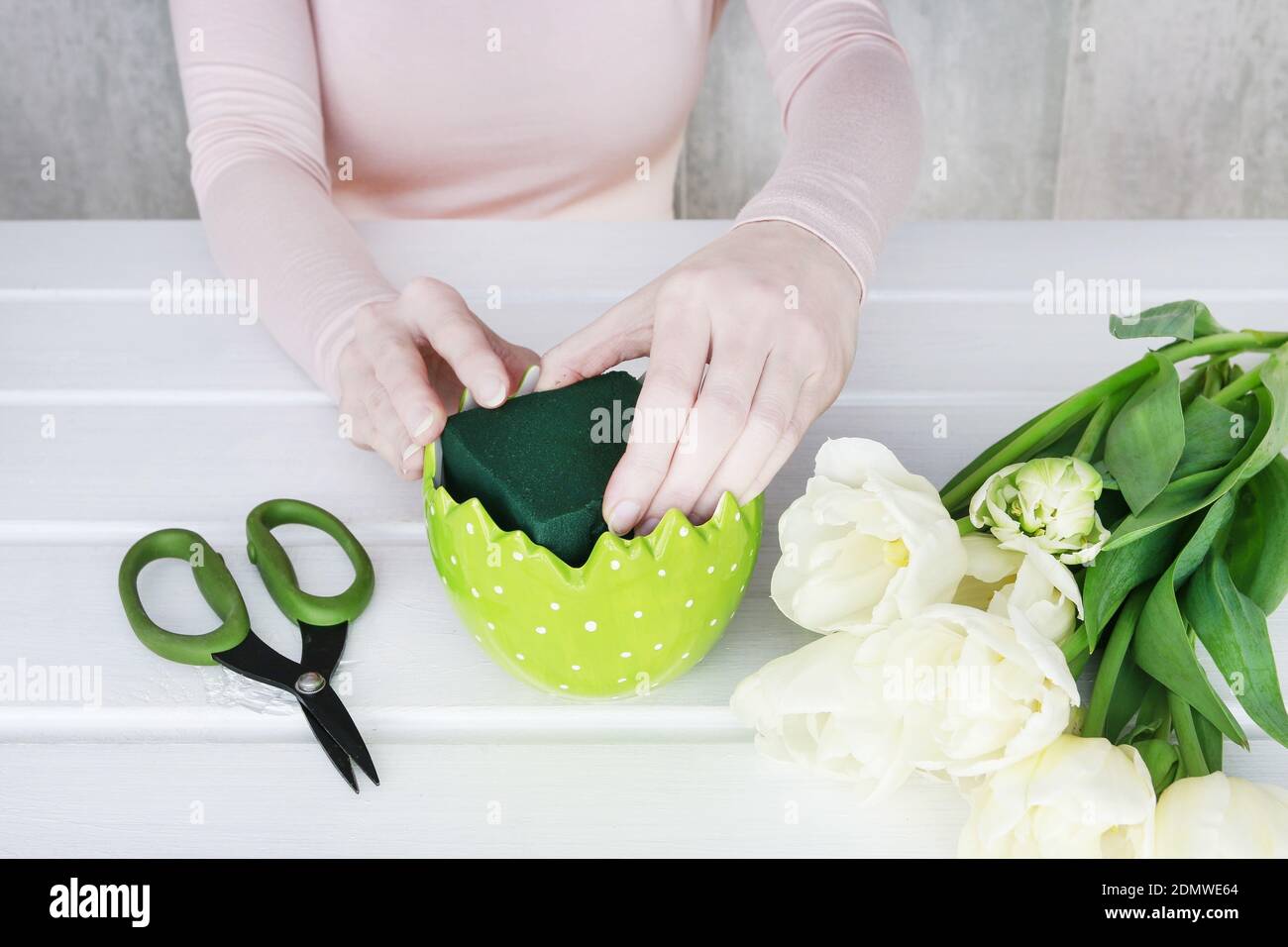 Florist at work How to make beautiful spring floral arrangement with
