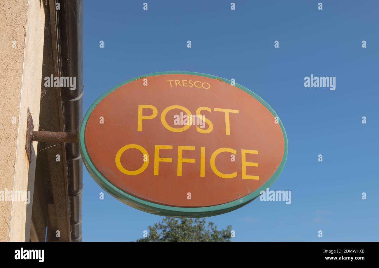 Tresco Post Office Sign with a Bright Blue Sky Background on the Island of Tresco in the Isles of Scilly, England, UK Stock Photo