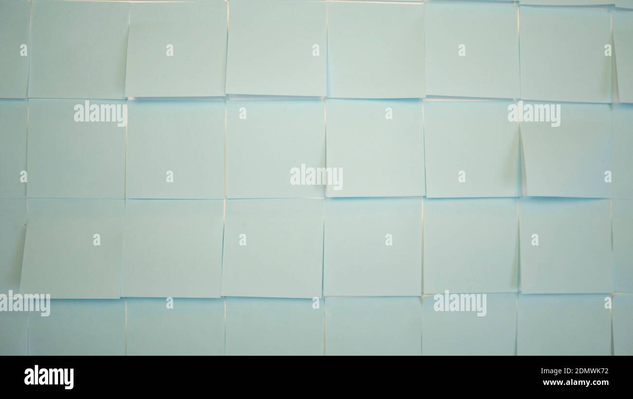 Blue stickers backdrop. Empty paper sticky, notepapers Stock Photo