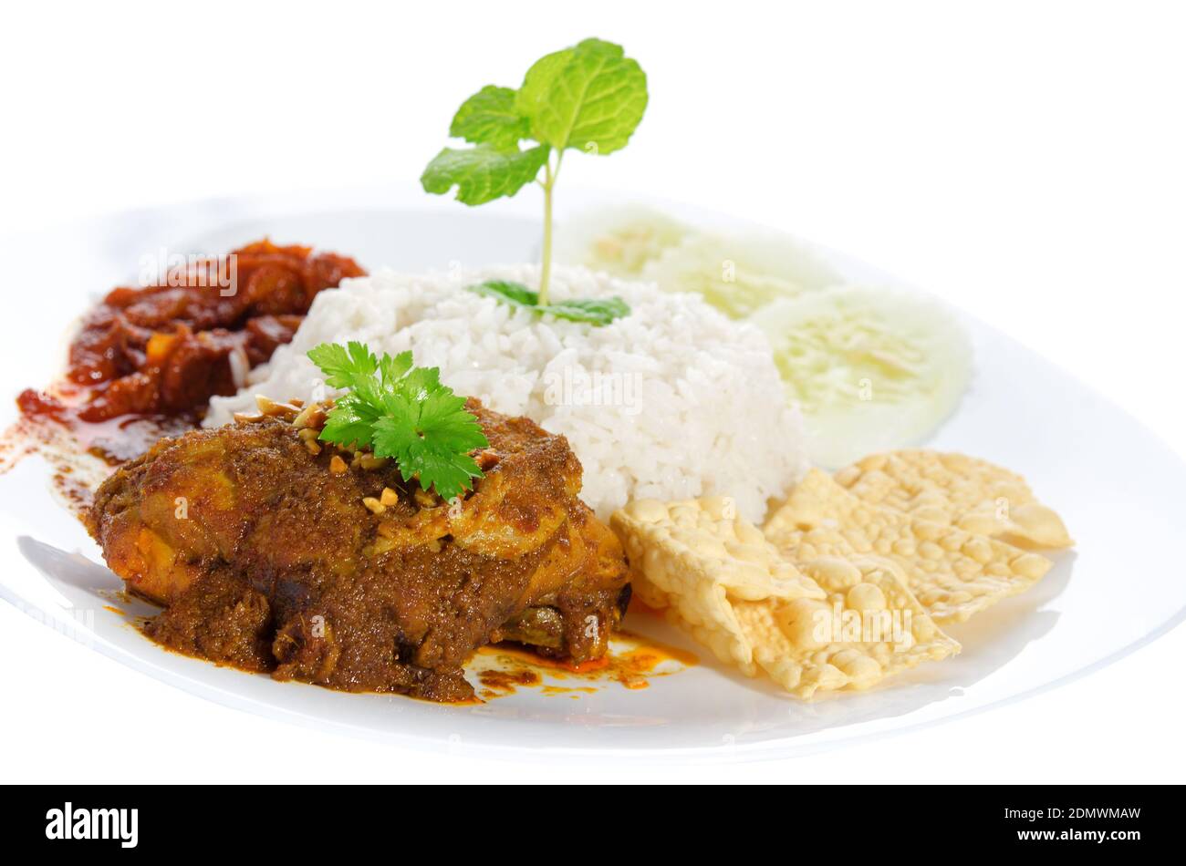 Nasi Lemak Is Traditional Malaysia Spicy Rice Dish Served With Belacan Ikan Bilis Acar Peanuts And Cucumber Isolated On White Background Popular Malaysian Food Asian Cuisine Stock Photo Alamy