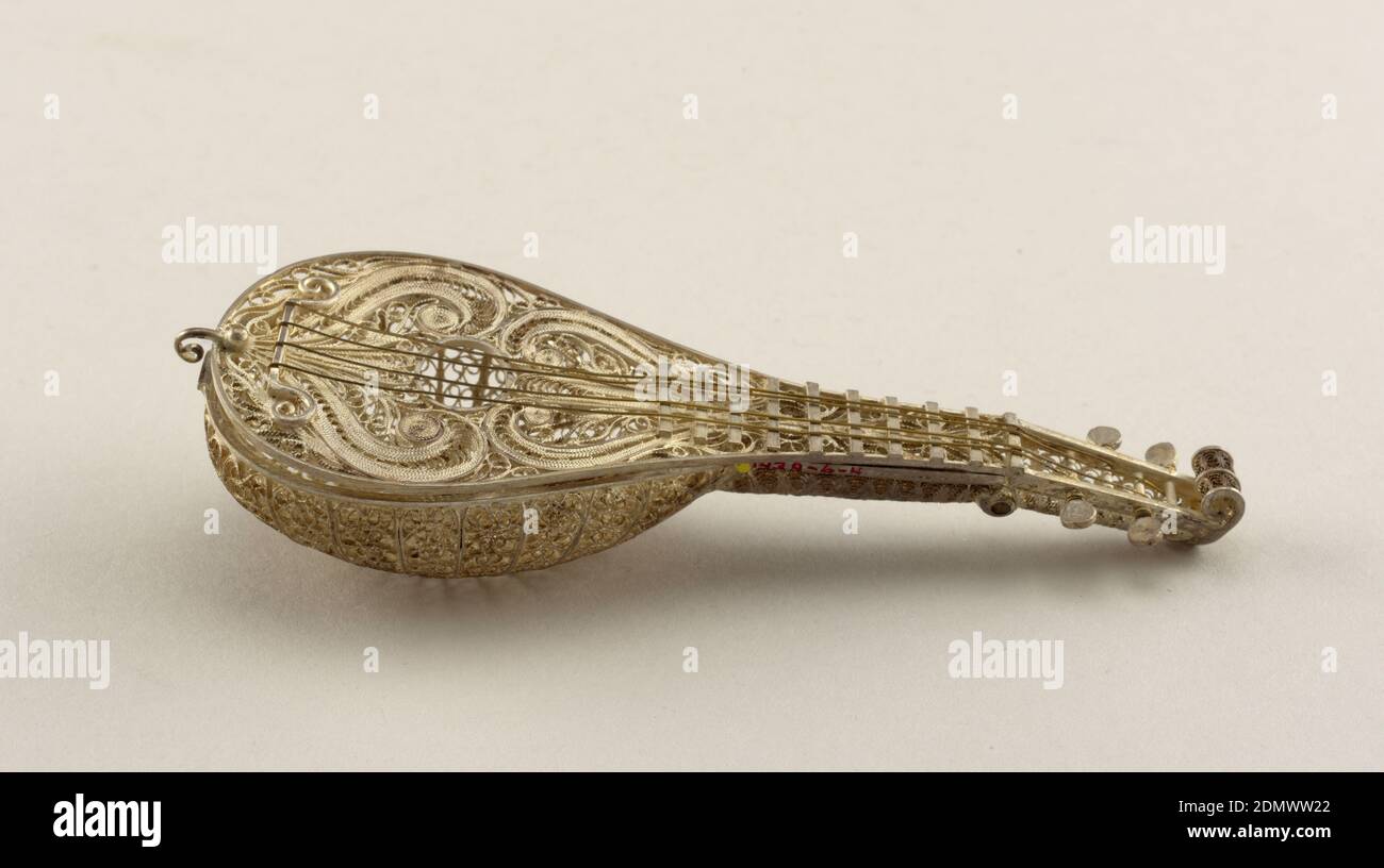 Mandolin, Silver filigree, Top worked in plumose designs; equipped with four keys and brass strings. Underside of sound box opens on hinge and is constructed of radiating ribs with open scrollwork filling the spaces between., Italy, mid-19th century, miniatures, Decorative Arts, Miniature, Miniature Stock Photo