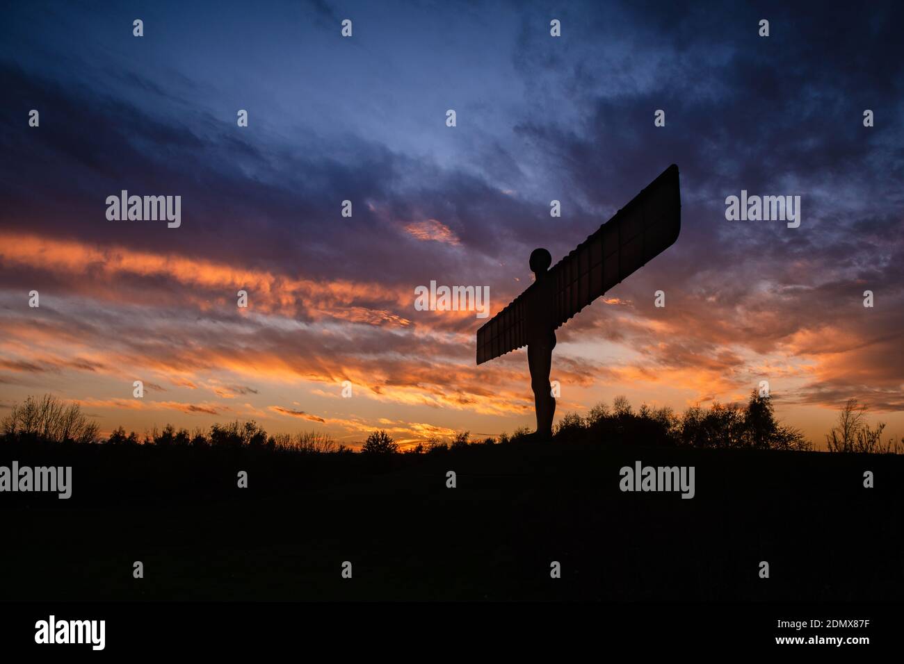 A sunset view of the Gateshead based Angel of the North by Antony Gormley Stock Photo