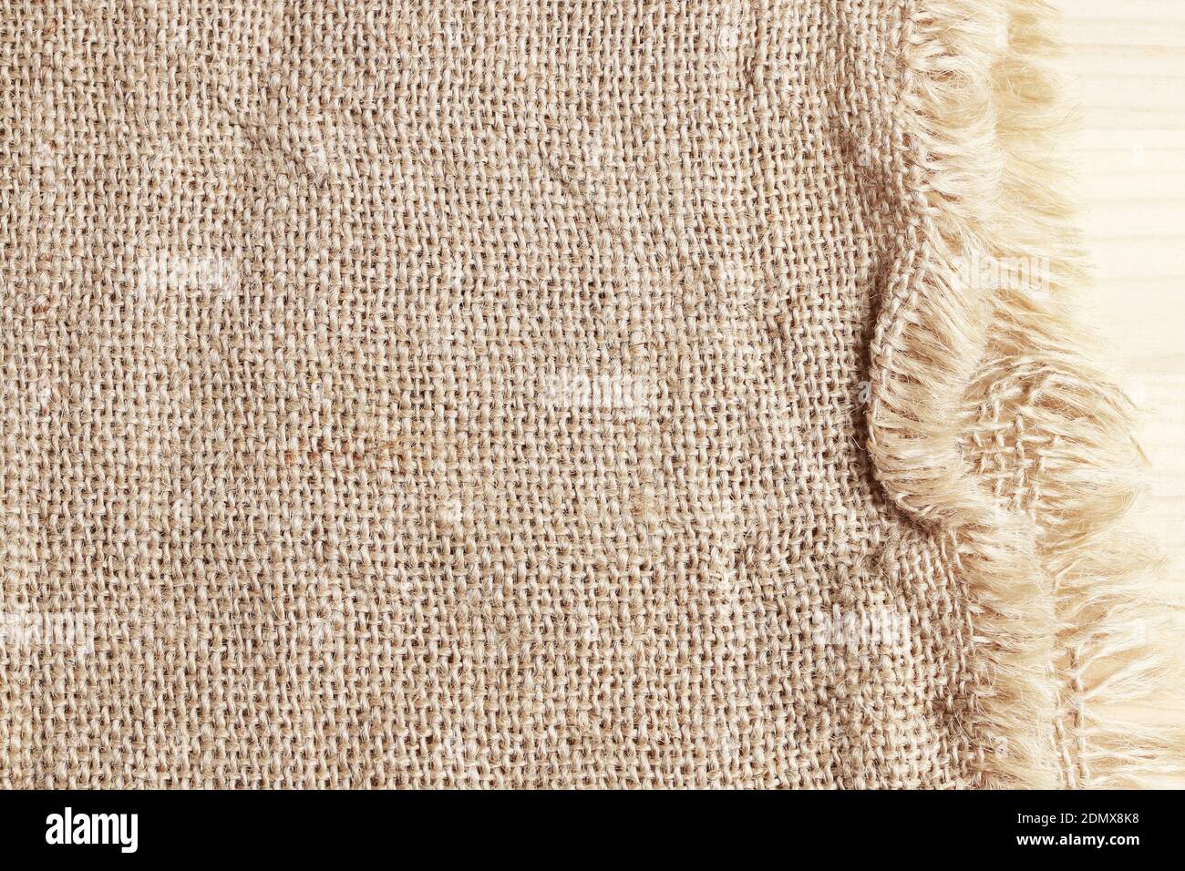 Jute sack on wooden background. Graphic resources Stock Photo - Alamy