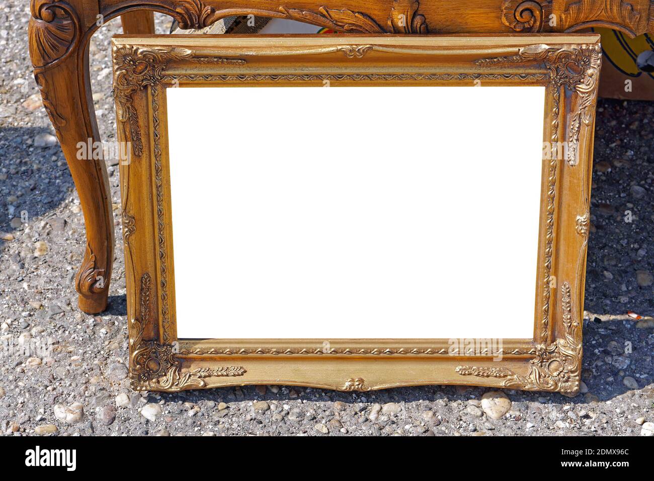 Empty space gold picture frame outside Stock Photo - Alamy