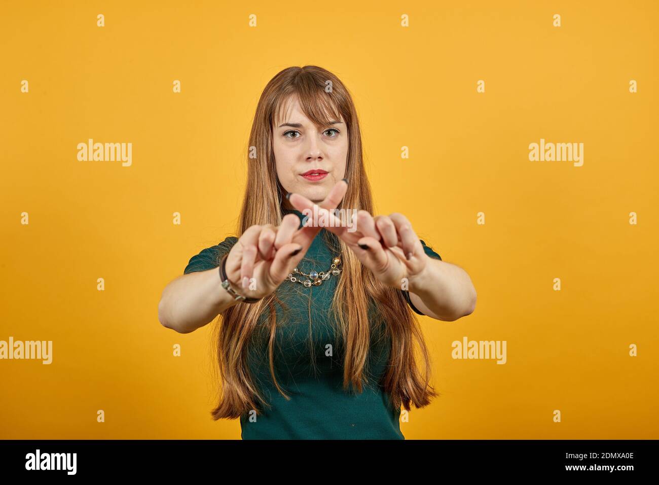 Japanese gesture for no. Crossed fingers, hands crossing forefinger