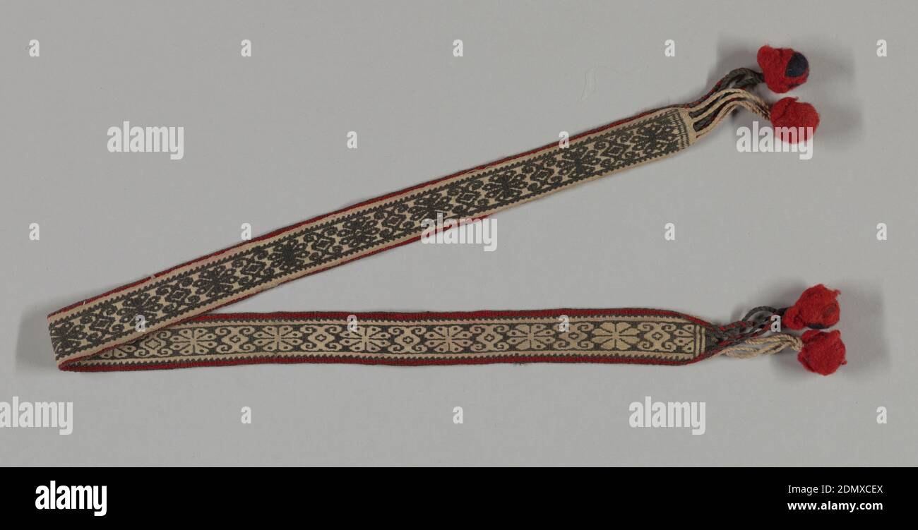 Headband, Medium: wool Technique: doublecloth, Man's headband with geometrical motifs in tan on black background, red border. On each end, pompom pendant on attached cords., Alta Vista, Nayarit, Mexico, probably 19th century, woven textiles, Headband Stock Photo