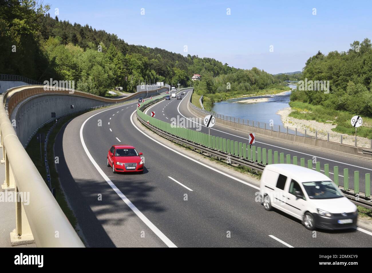 A multilane road passes through areas of high landscape value. Highway