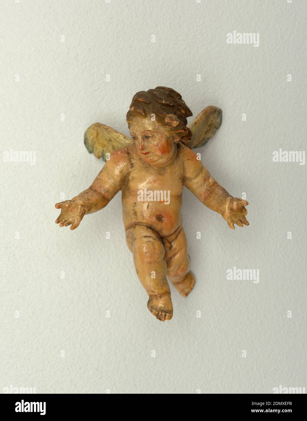 Angel figure, Painted papier-mâché, Cherub with outstretched arms, one leg forward, head facing to his right. Painted accents on wings. ., Italy, 18th century, figures, Decorative Arts, Angel figure Stock Photo