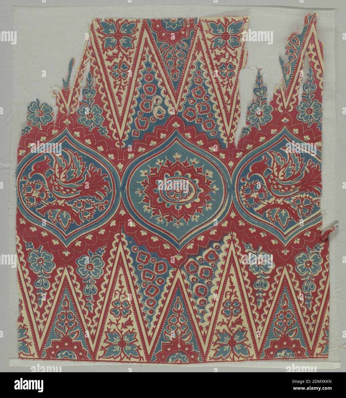 Textile, Medium: cotton Technique: wax resist dyeing (batik) on plain weave, Row of three ogival medallions: middle one with rosette, outer two with crested bird and flowers as well as remnants of deep toothed zigzag border on either side. Much filling decoration. In reds and blues on very fine white cotton ground., Indonesia, 18th–19th century, printed, dyed & painted textiles, Textile Stock Photo