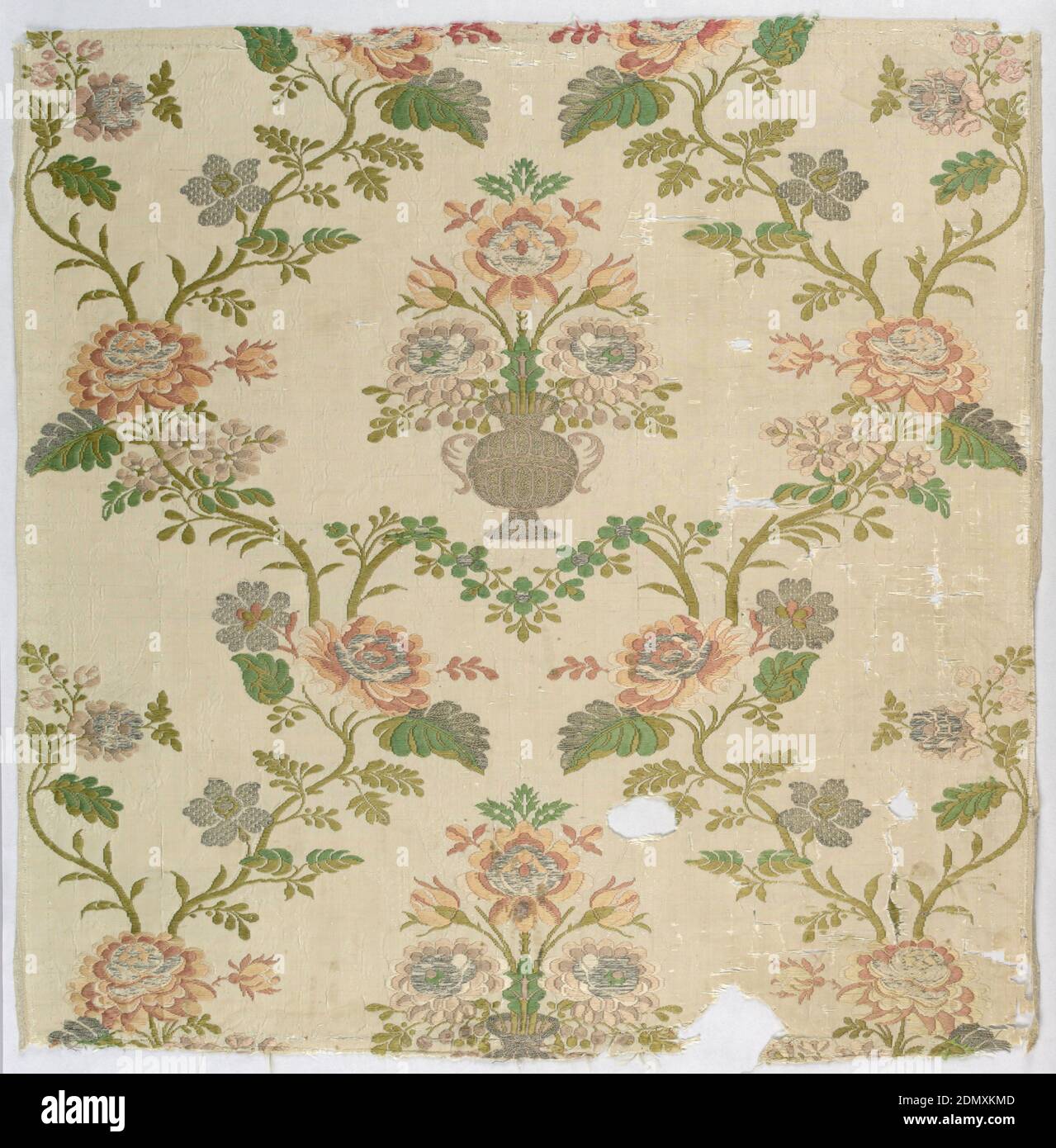 Fragment, Medium: silk Technique: plain weave with discontinuous suypplementary wefts (brocading)., Symmetrical design of curving vines with flowering urn in the center., ca. 1750, woven textiles, Fragment Stock Photo