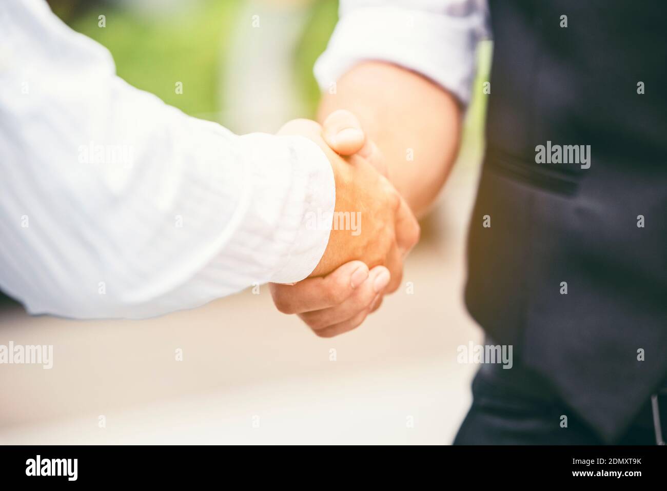 Business People Shaking Hands Stock Photo