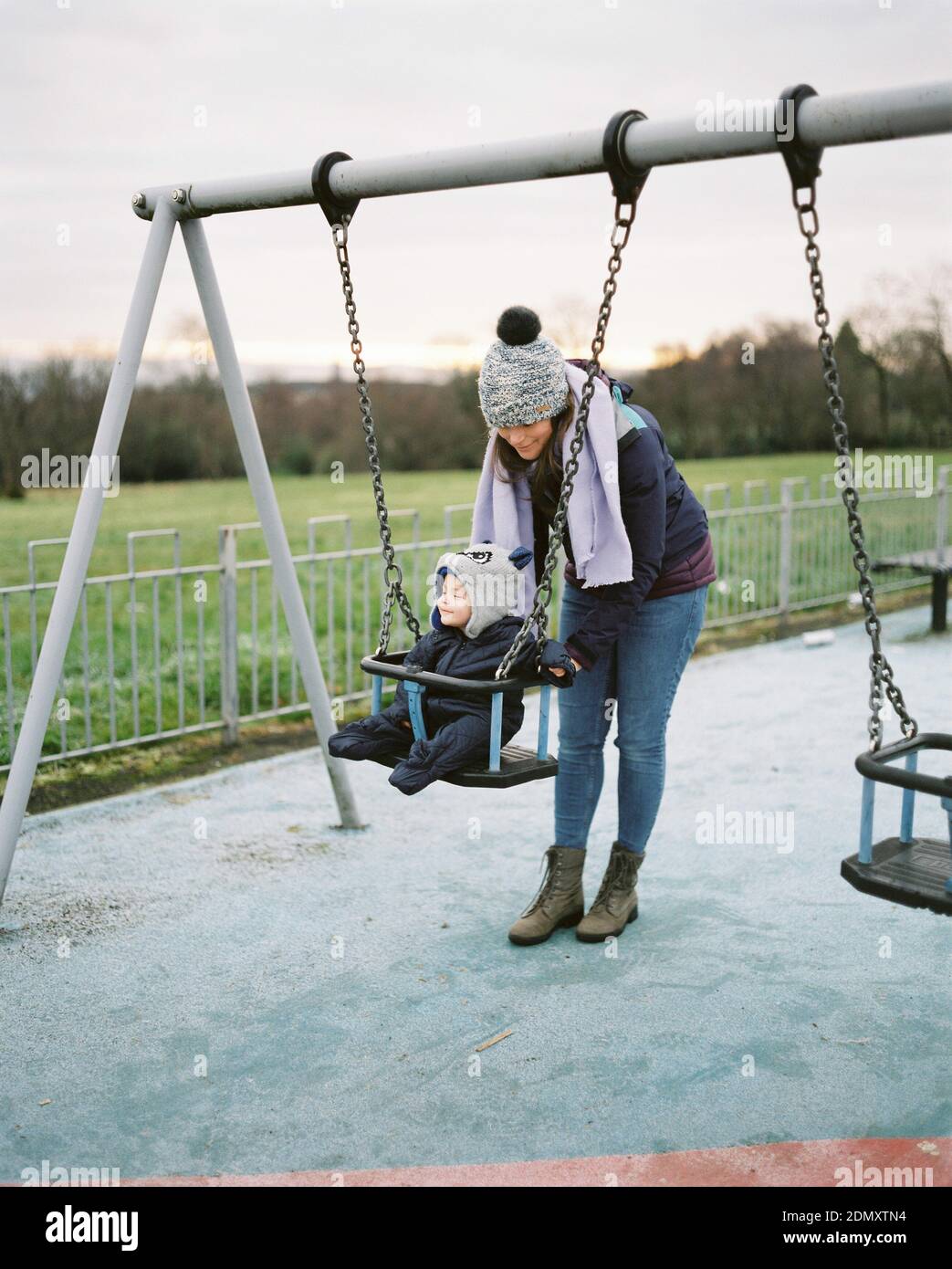 Mother And Son Playing On Playground Stock Photo - Alamy