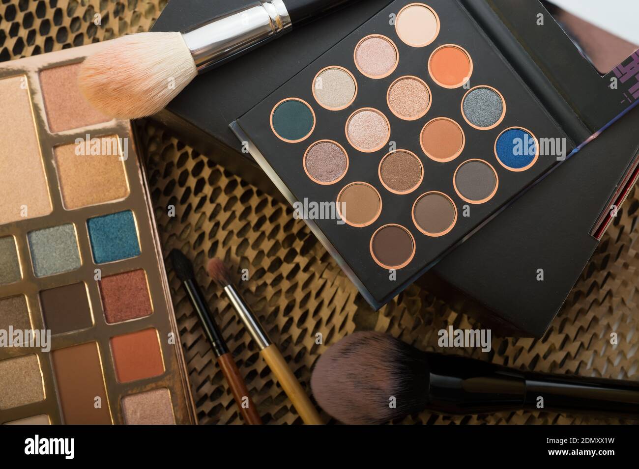 High Angle View Of Eyeshadow Palettes On Table Stock Photo
