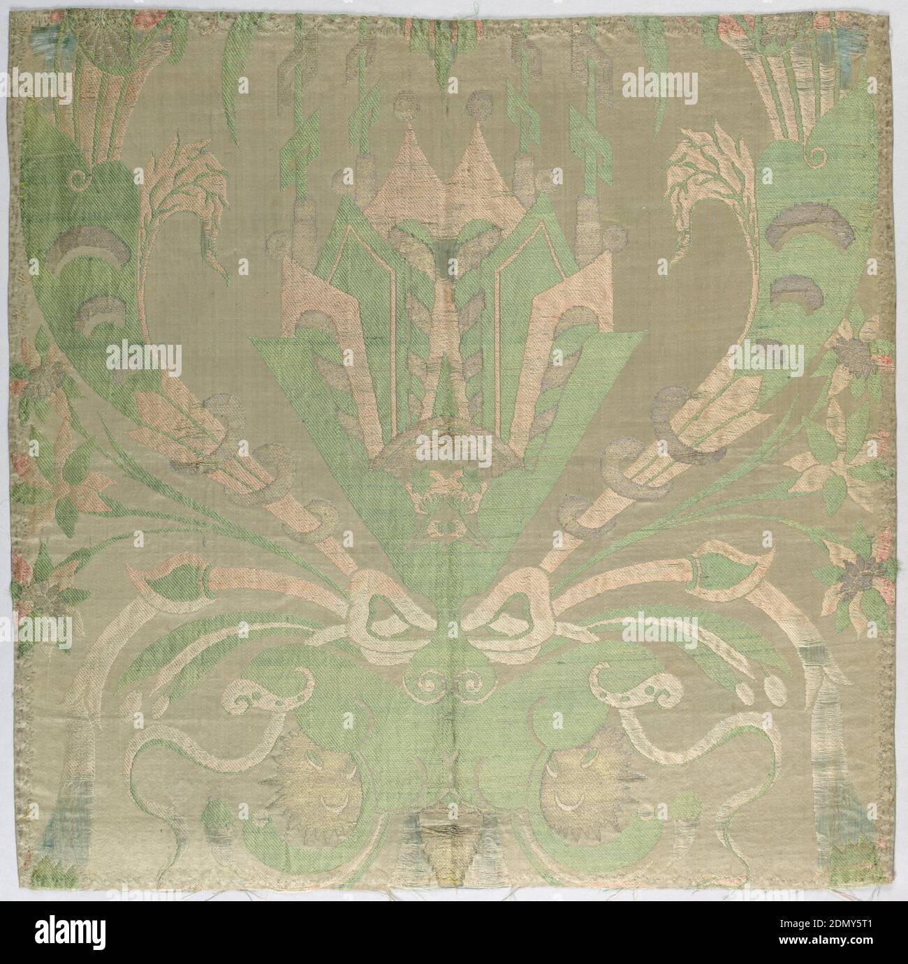 Textile, Medium: silk, metallic yarns Technique: compound satin weave with supplementary weft patterning (brocade), White satin ground brocaded with symmetrical design in gold, and green, coral and pink silk. Large, central fan-shaped ornamental motif with cornucopia and a bow. Backed with red silk and edged with gold metal lace., Spain, 17th century, woven textiles, Textile Stock Photo