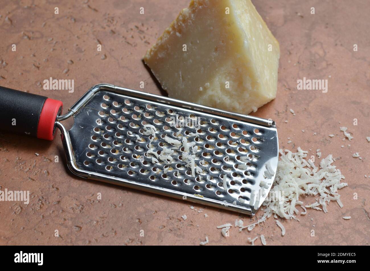 Chunk Of Hard Parmesan Cheese For Grating Stock Photo Alamy