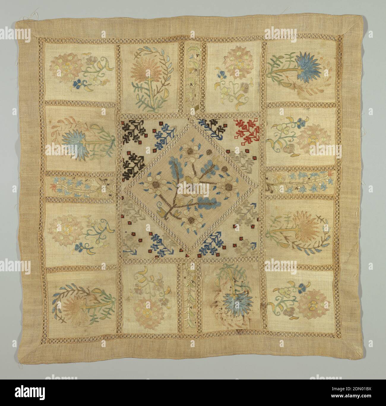 Table cover, Medium: silk and metal embroidery on linen foundation Technique: embroidered on plain weave, Square made up from small squares of embroidery joined with insertions of torchon lace. Large center square has stylized sprig repeat., Turkey or Greece, 19th century, embroidery & stitching, Table cover Stock Photo