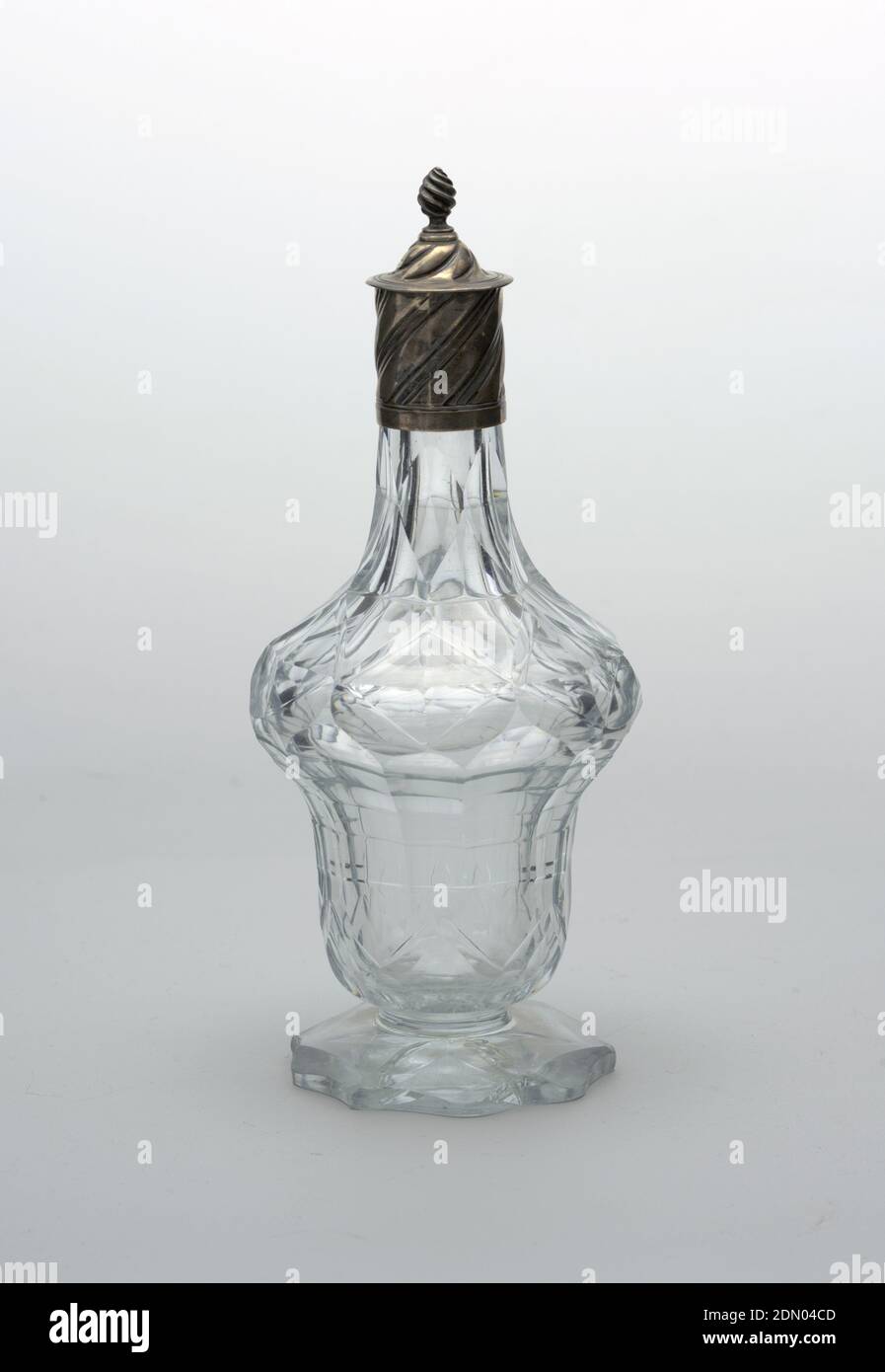 https://c8.alamy.com/comp/2DN04CD/covered-bottle-glass-silver-double-ogee-form-tall-neck-flat-circular-base-with-scalloped-edge-star-cut-on-bottom-body-cut-with-flat-geometric-patterns-silver-cover-with-straight-sides-conical-top-both-with-twisted-incised-lines-flame-finial-glass-has-blue-cast-england-17501800-glasswares-decorative-arts-bottle-bottle-2DN04CD.jpg