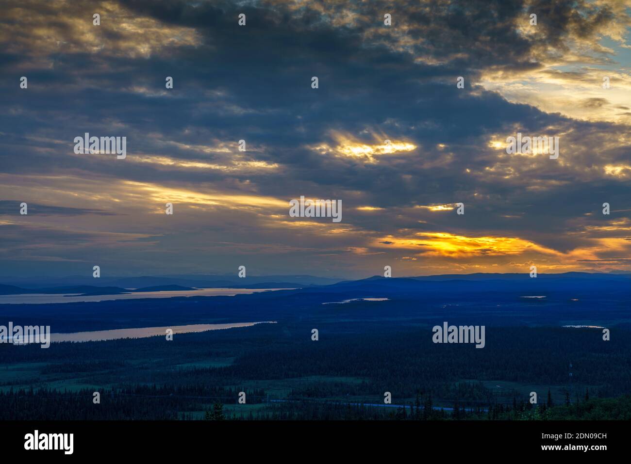 Vew from mount Sörstubba over Laponia world heritage and the Mountains of Sarek nationalpark in background at sundown, Swedish Lapland, Sweden Stock Photo