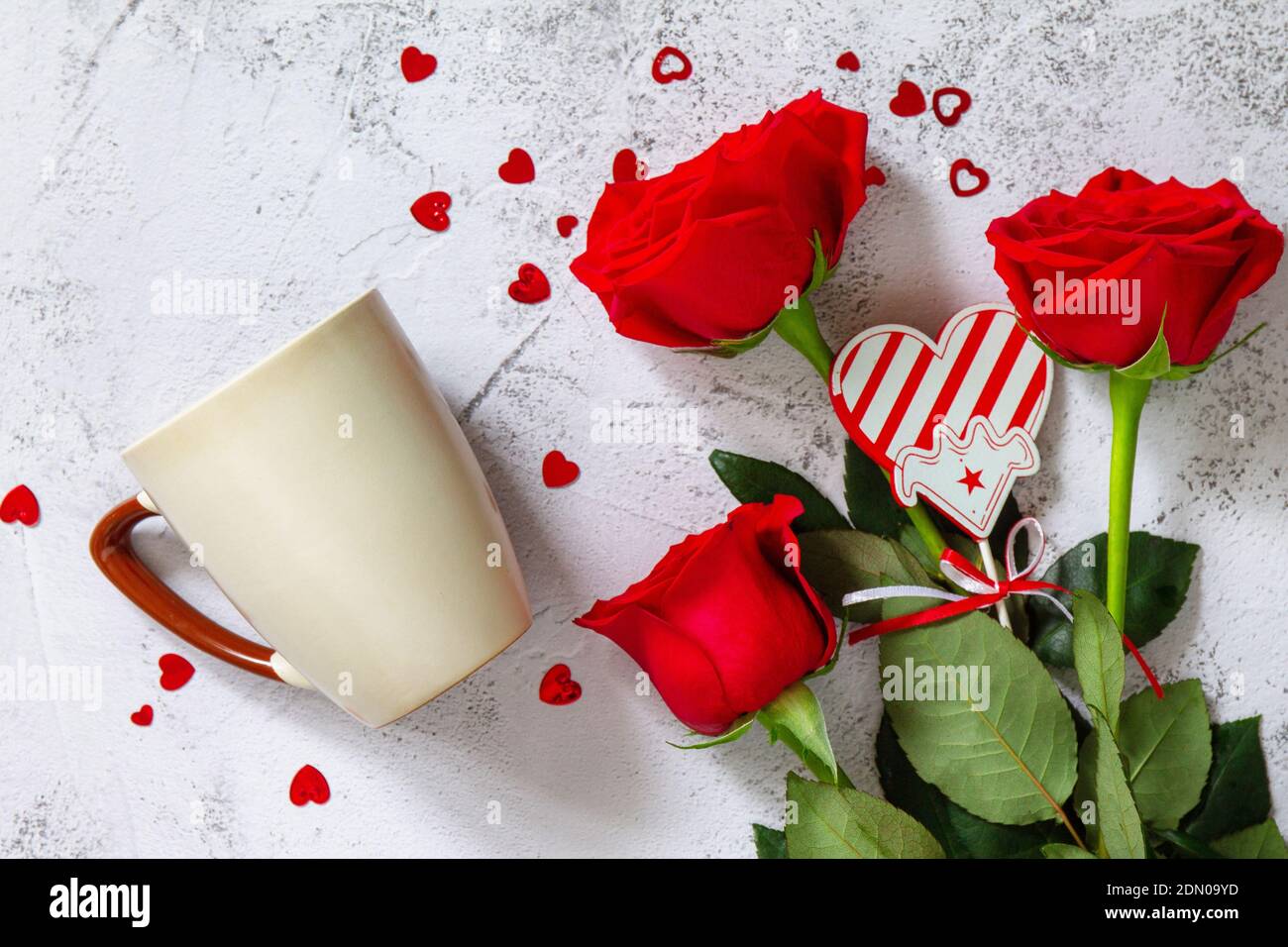 Valentine's Day Concept. Coffee mug mockup with red roses on Ultimate Gray  background. Space for text or design. Top view flat lay Stock Photo - Alamy