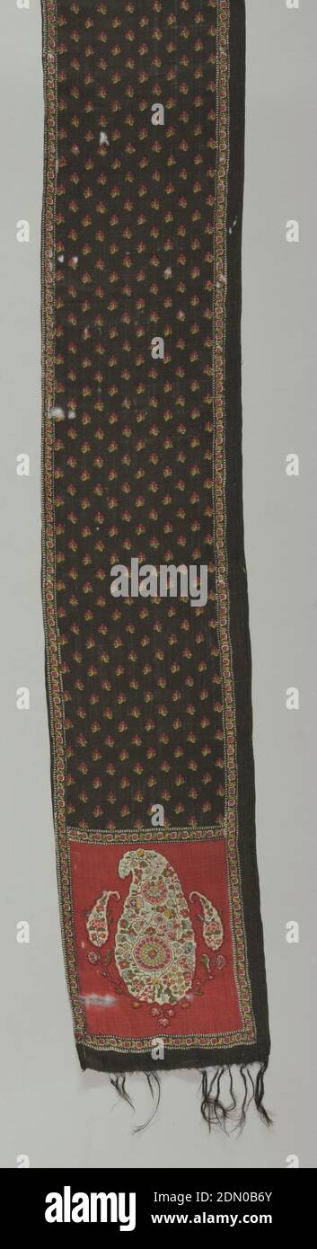 Scarf, Medium: wool Technique: printed on twill weave, Fine printed wool scarf; fringed at ends; black background in body of scarf; red background at ends; polychrome print in persian cone pattern; one long edge hemmed., Europe, 1860–70, printed, dyed & painted textiles, Scarf Stock Photo