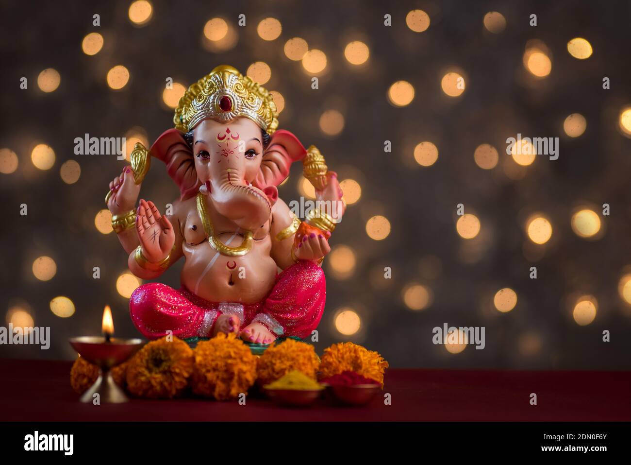 Close-up Of Ganesha Statue Against Illuminated Lighting Stock ...