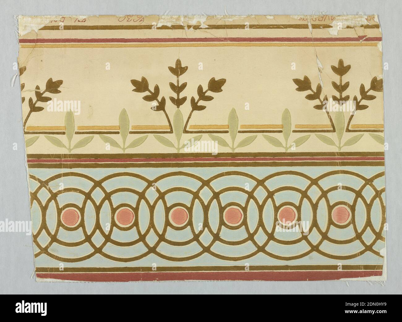Frieze, Robert Graves Co., New York, New York, Machine-printed, Border; upper half consists of series of interwined gilt circles forming a geometric pattern. In center of each is a coral colored disc in light blue field. Lower portion consists of stylized stiff sprays, three stems each ofgilt leaves under a series of three petalled formal gray-olive leaf motifs all on a bisque field. Deep coral, gold and gilt lines top, botton and in center of border. 'No. 1639, Robert Graves Co.' printed in selvedge., USA, 1890–1900, Wallcoverings, Frieze Stock Photo