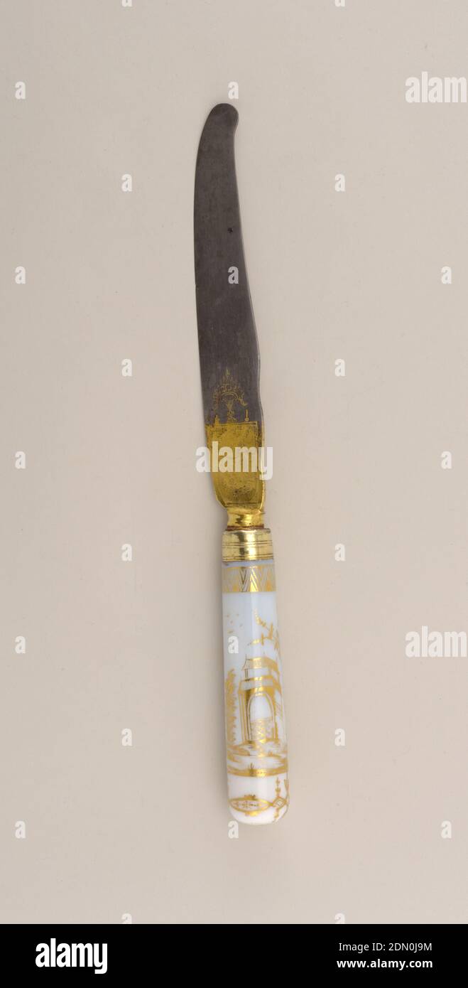 Knife with Porcelain Handle, glass, steel, gold, brass, Sabre-shaped blade, engraved and gilded on both sides with a cartouche of eagle's head and initial 'W.' Plain bolster and brass (?) ferrule, both gilded. Tapering handle, round in section, of white milk glass with gold Chinoiserie design in gold. Figure with parasol in front of table with vase of flowers set in landscape, trees and pagoda/house., Germany, 1750–1800, cutlery, Decorative Arts, knife, knife Stock Photo