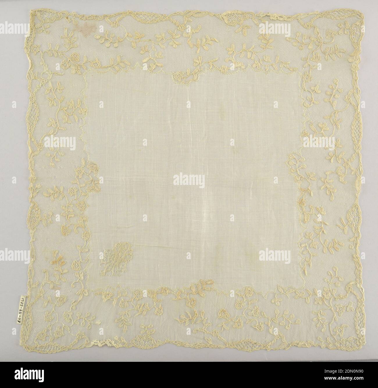 Handkerchief, Medium: linen Technique: embroidered with lace border, Linen center with monogram J.M.N. and border of Mechlin lace in design of pendant flowers., France, 18th century, lace, Handkerchief Stock Photo