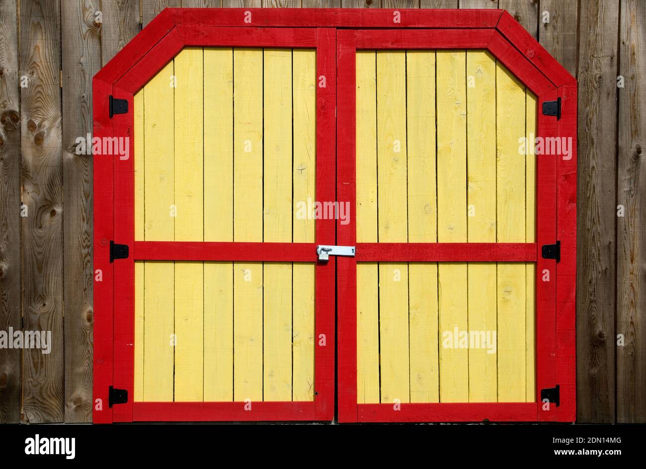 Beautiful Red and Yellow Barn Doors with Weathered Wood Horizontal
