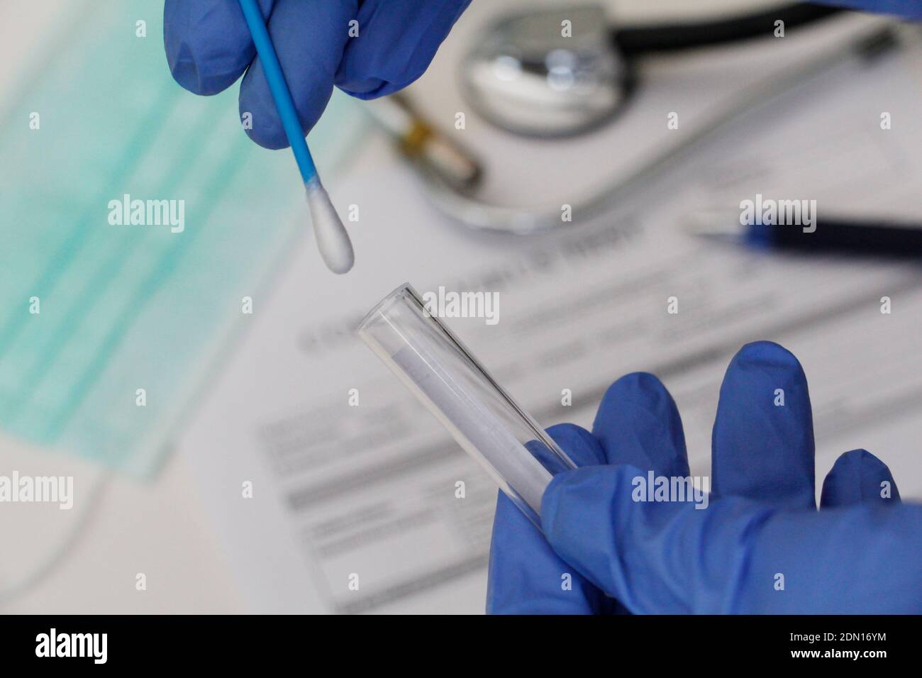 Cotton swab surgical glove hi-res stock photography and images - Alamy