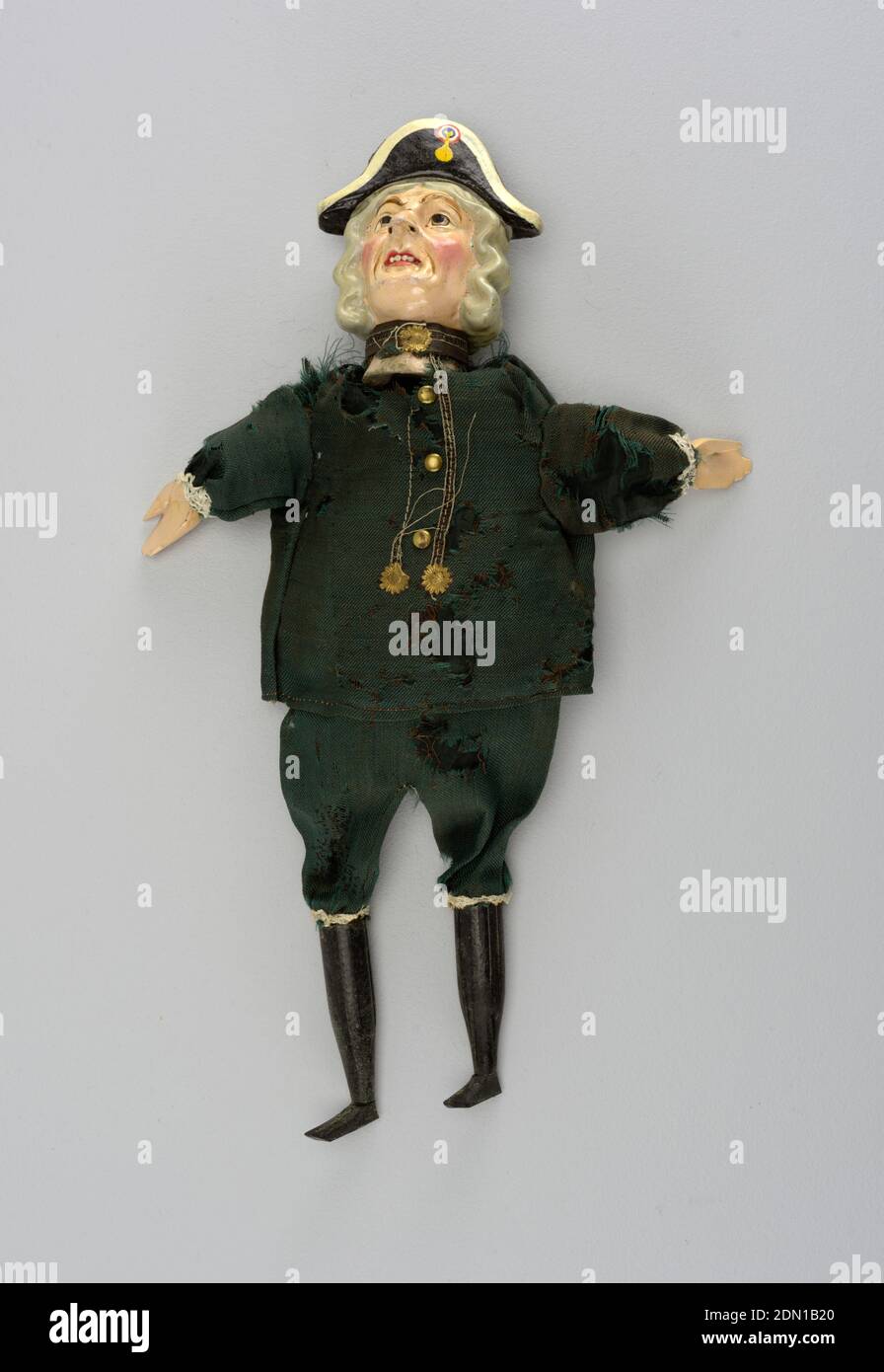 The Admiral, Painted wood, cotton, other materials, Brightly painted head with black and white bicorn with tri colored cockade. Green uniform. Black hose and shoes. Gold buttons and decorations. Lace at knees and cuffs. Possible a caricature of Admiral Nelson., England, late 19th century, theater, Decorative Arts, Puppet, Puppet Stock Photo
