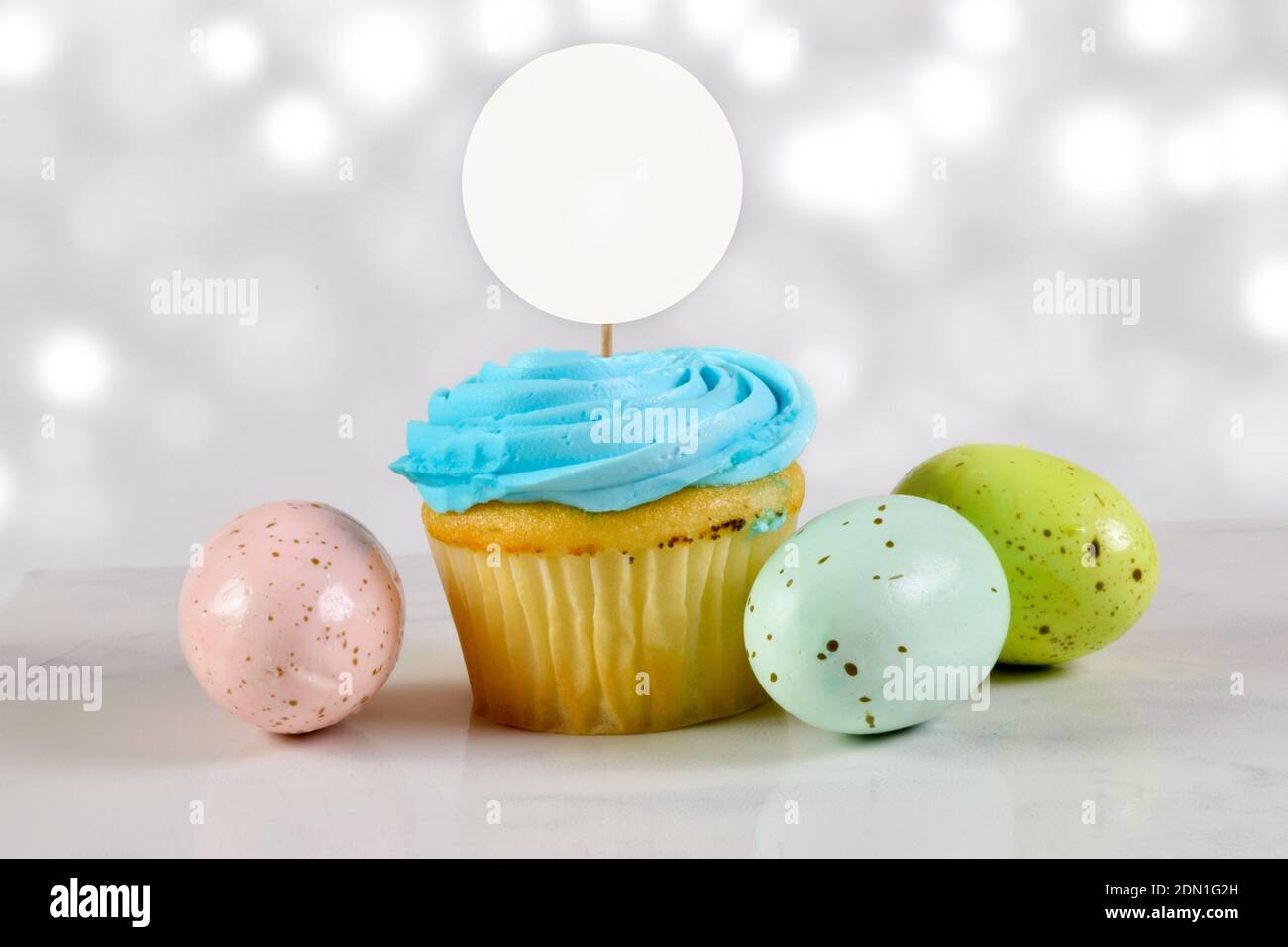Download Cupcake Topper Mockup With Colorful Easter Eggs Stock Photo Alamy