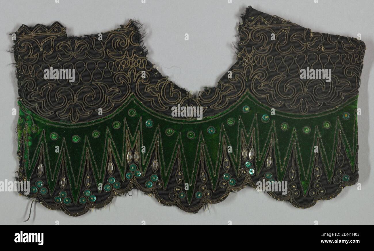 Embroidery sample, Medium: silk, metal, glass; section of dress-trimming Technique: cloth with velvet applique, couched gold cord, glass sequins, Fragment of black, weft-ribbed silk cut at the bottom into three wide shallow scallops, in turn scalloped, with applied section of bottle green velvet; double row of couched gold cord outlining velvet and encircling applied faceted green glass sequins., France, 1875–1900, embroidery & stitching, Embroidery sample Stock Photo