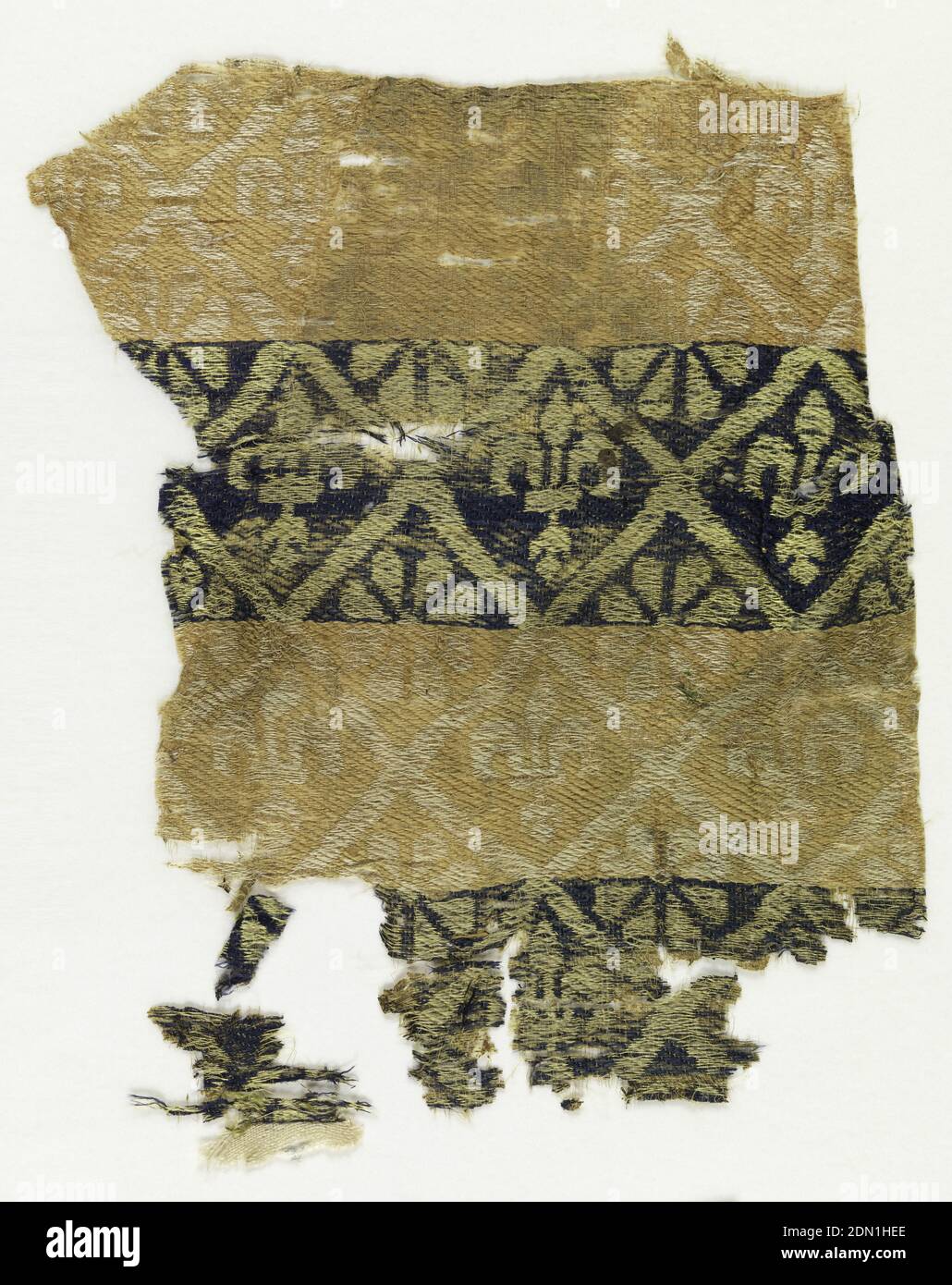 Fragment, Medium: silk Technique: compound weft twill (samite), Fleur de lys within a diamond grid on a banded background in beige, white, blue and green., possibly Sicily, 13th century, woven textiles, Fragment Stock Photo