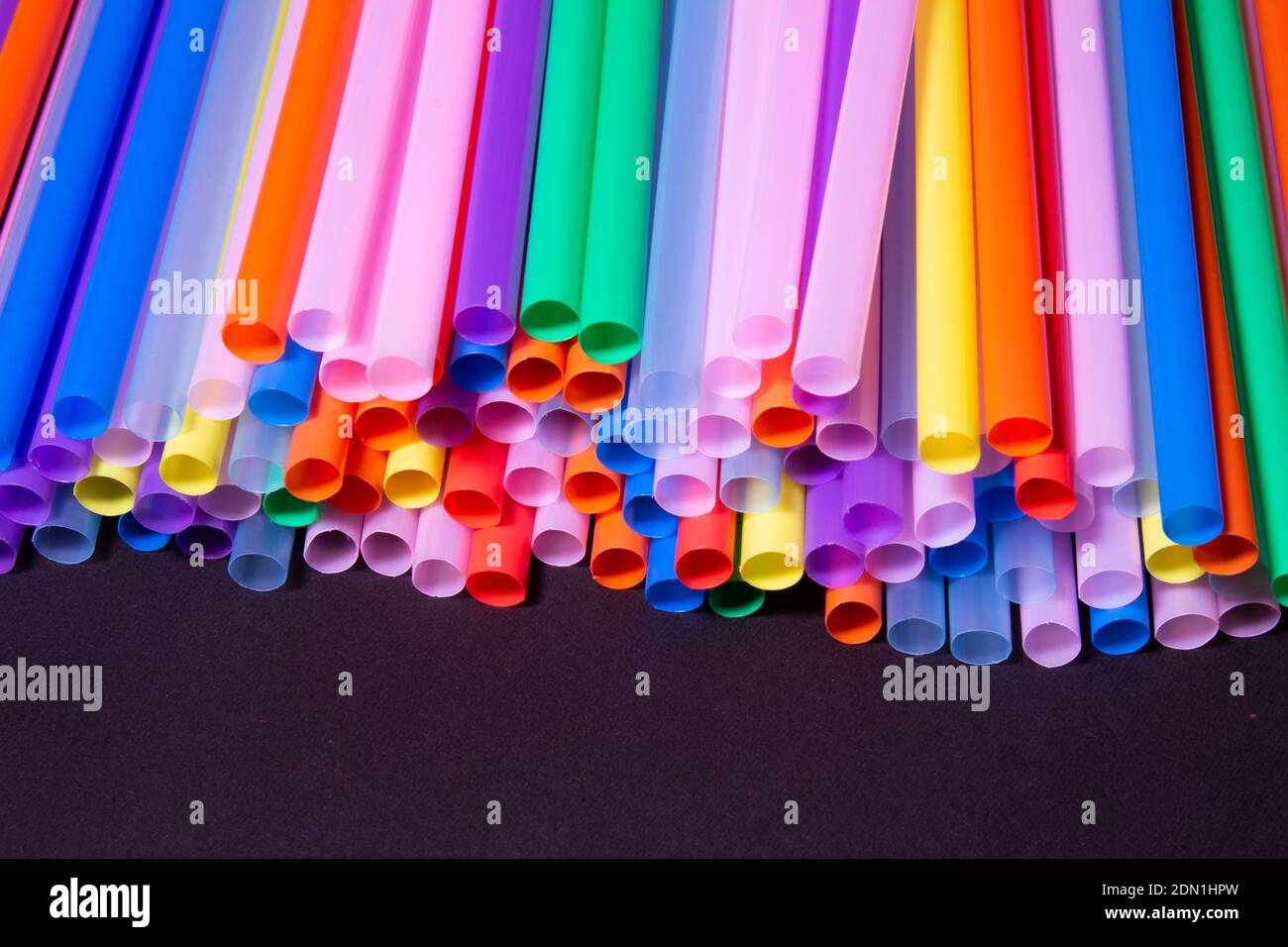Close up view of plastic straws. Texture. Concept for prohibition in