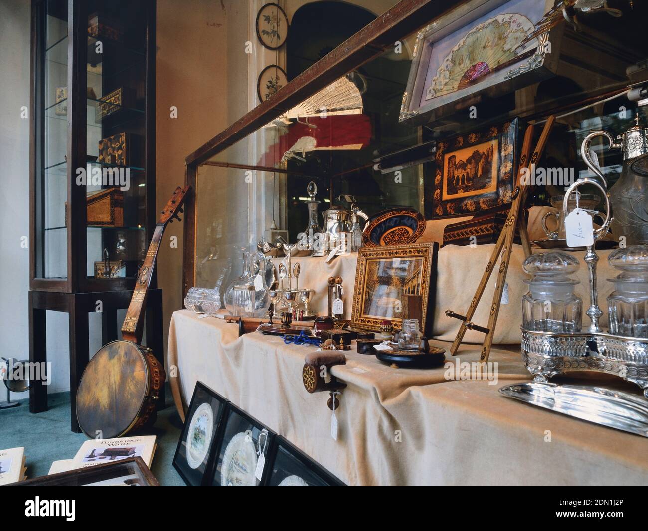 Antique shop window, Royal Tunbridge Wells, Kent, England, UK Stock