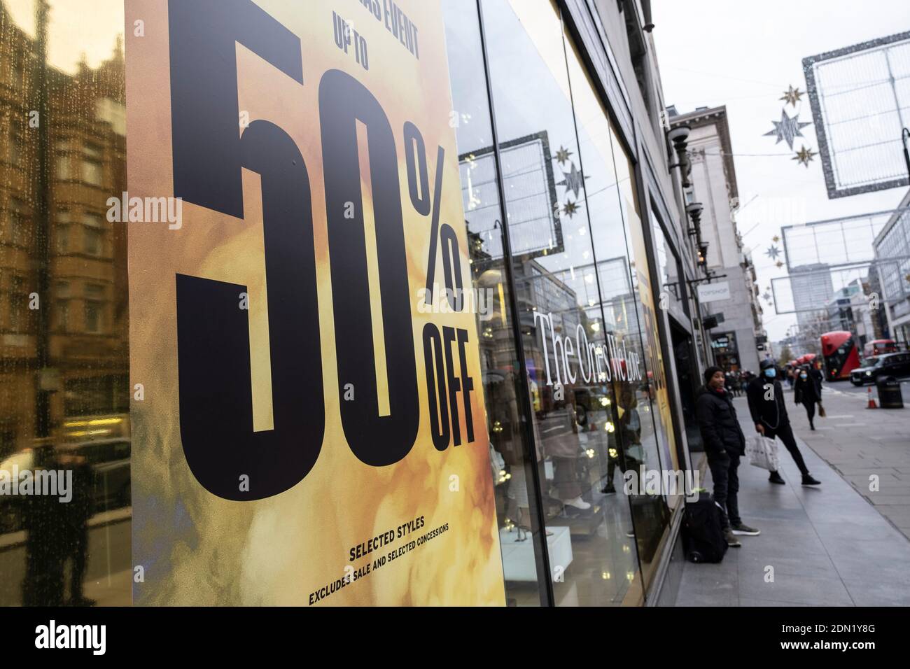 As the national lockdown ends and the new three tier system of local  coronavirus restrictions begins, shoppers head out to Oxford Street to  catch up on shopping as non-essential shops like fashion