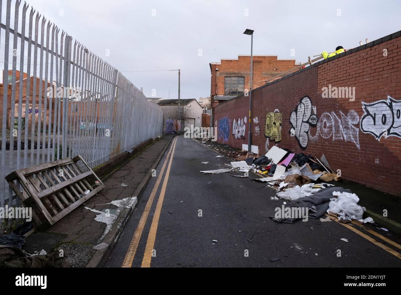 Fly tipped waste on the street on an industrial estate in Deritend