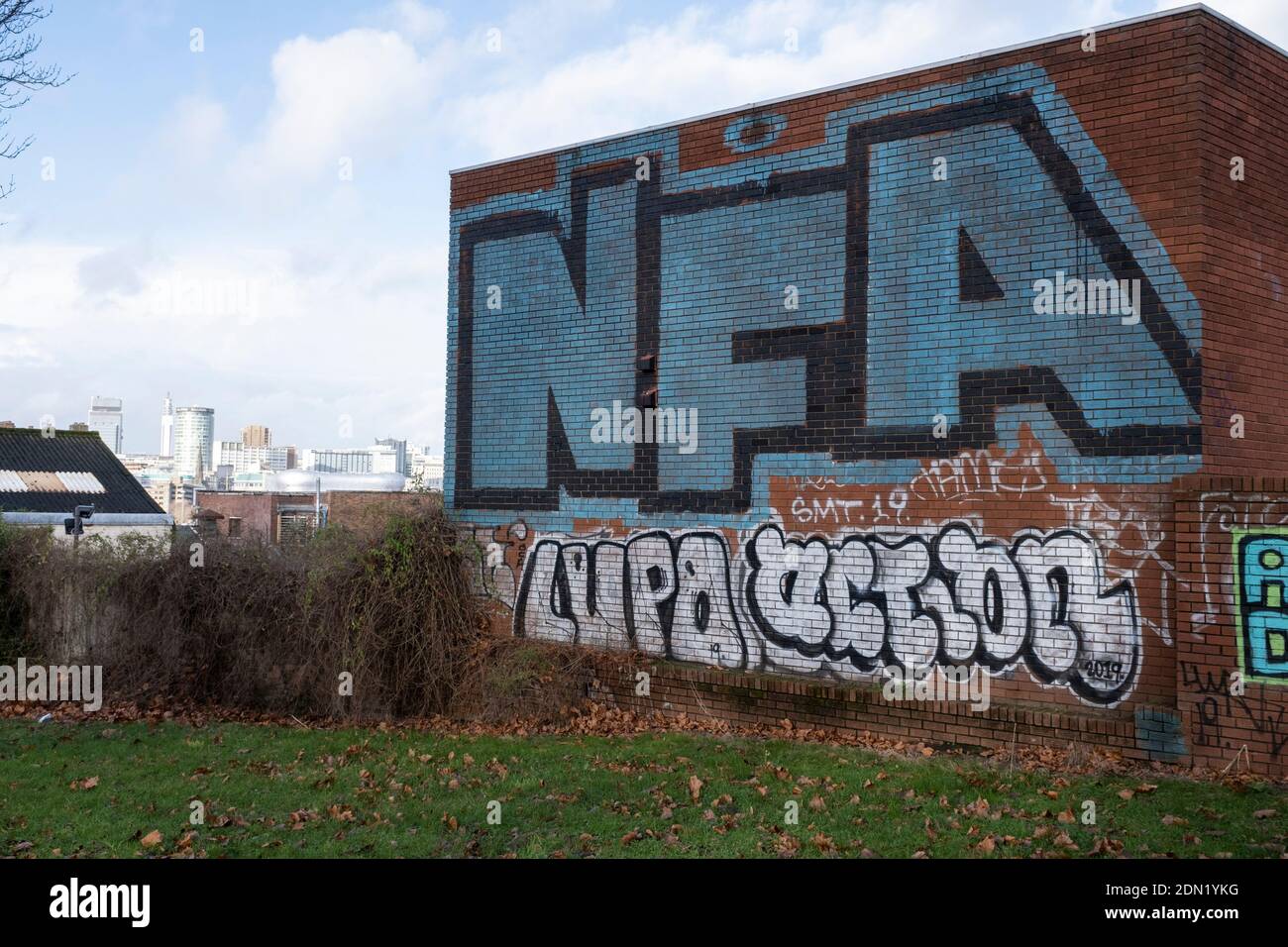 Large NFA graffiti crew letters sprayed on a wall in the inner city area of Highgate on 14th December 2020 in Birmingham, United Kingdom. This is a common signt in Birmingham, with the letters standing for expletive Not F-ing Around. Stock Photo