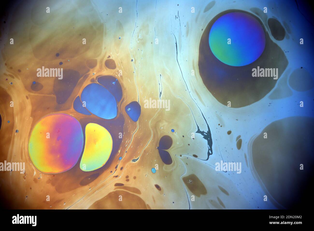 Old spilled on water Stock Photo