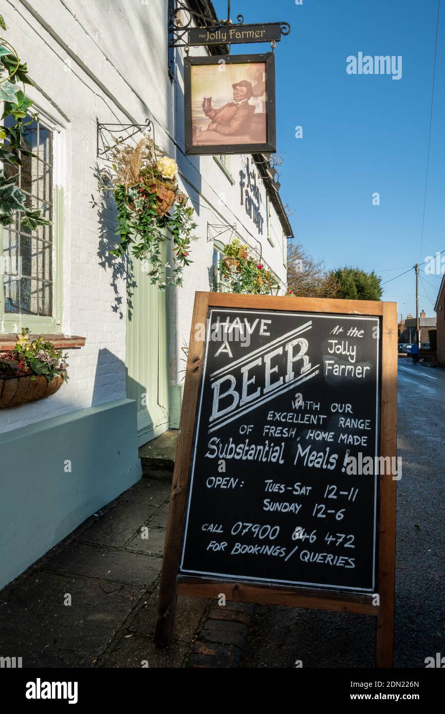 Sign advertising a pub serving substantial meals, a reference to being open during tier 2 restrictions in the coronavirus covid-19 pandemic, UK, 2020 Stock Photo