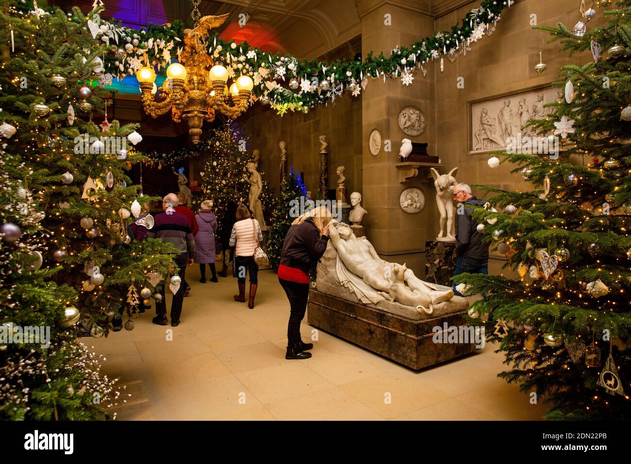 UK, England, Derbyshire, Edensor, Chatsworth House Sculpture Gallery at Christmas, people visiting to see decorations Stock Photo