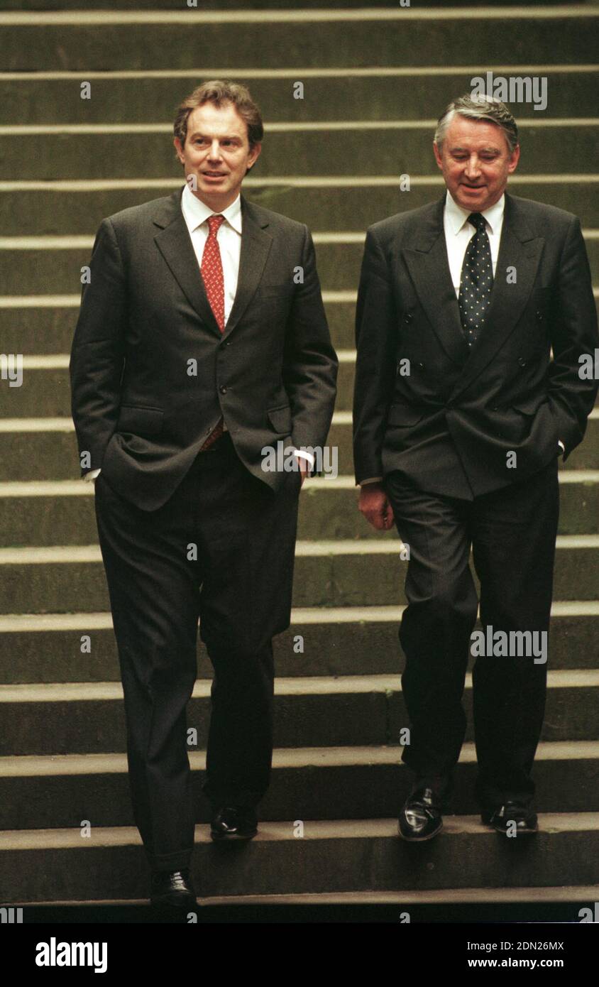 British Prime minister Tony Blair, accompanied by presiding officer Sir David Steel, leaving the Scottish parliament on the Mound in Edinburgh where he addressed MSPs at the parliament for the first time since government was devolved to Scotland. The General Assembly housed the Scottish parliament after it was opened on July 1st 1999 until the purpose-built building was completed at Holyrood in 2004. The new parliament gave Scots limited devolved powers from the United Kingdom government in London for the first time since 1707. Stock Photo