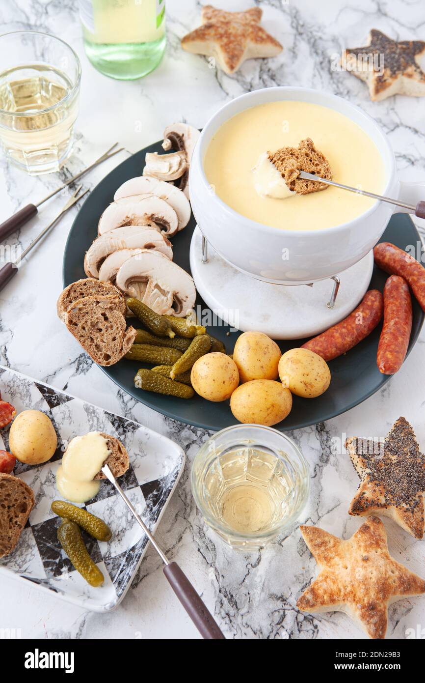 Delious cheese fondue with bread and vegetables Stock Photo Alamy