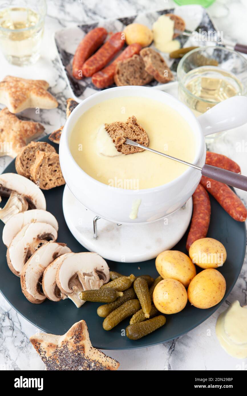Delious cheese fondue with bread and vegetables Stock Photo Alamy