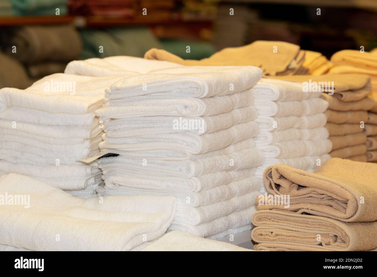 Stack Of Folded Towels In Hotel Stock Photo