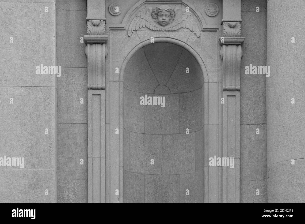 Elements of architecture of buildings, ancient arches, columns, windows and apertures. On the streets in Catalonia, public places. Stock Photo