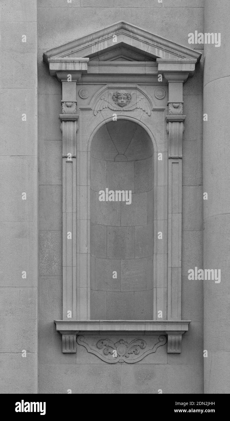 Elements of architecture of buildings, ancient arches, columns, windows and apertures. On the streets in Catalonia, public places. Stock Photo